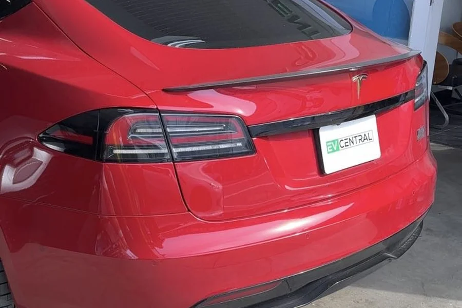 Red Tesla Model S at EV Central Service EV collision repair shop serving San Mateo Bay Area