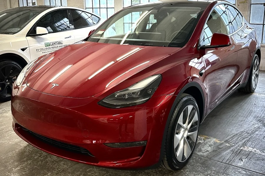 Red Tesla Model 3 at EV Central Service collision repair shop serving Sausalito and Mill Valley Marin County