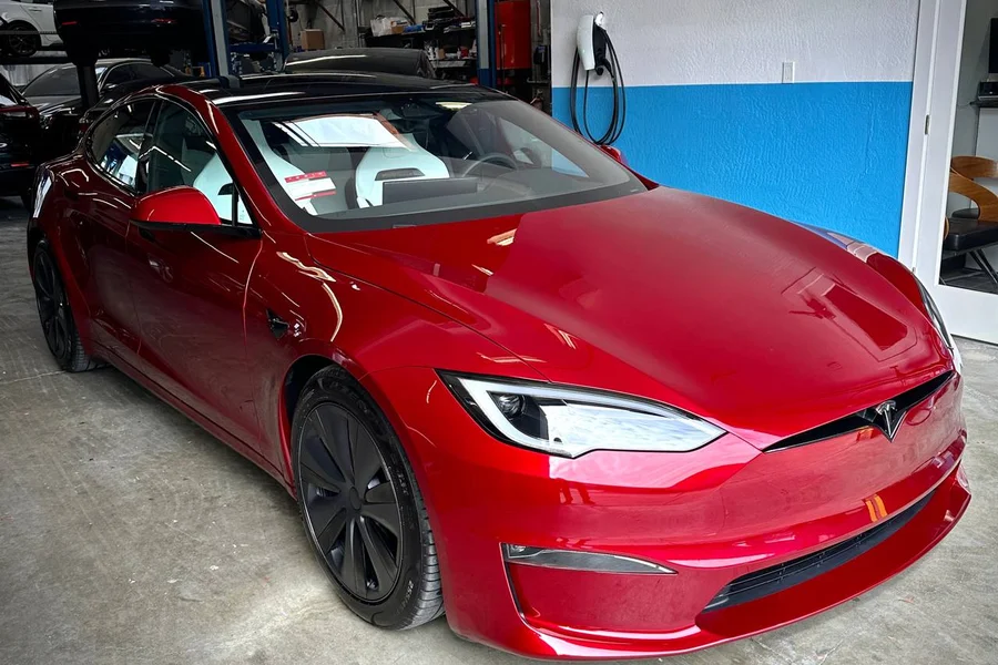 Red Tesla Model S Plaid at EV Central Service San Francisco shop for air suspension repair
