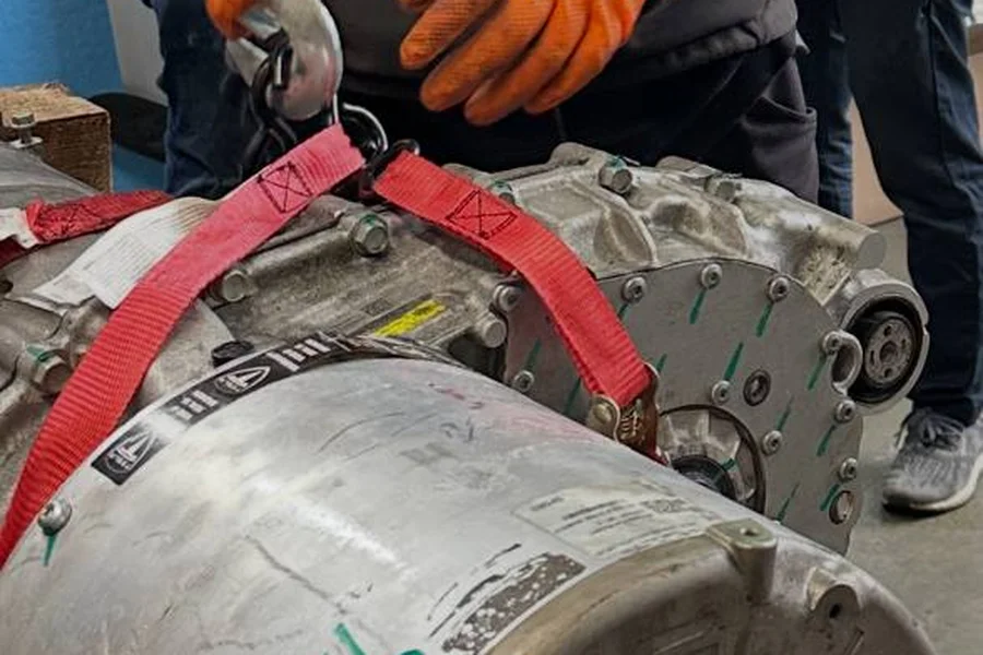 Tesla electric motor removal for regenerative braking diagnosis at EV Central Service San Francisco