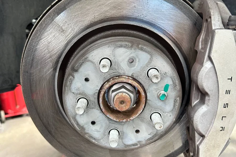 Tesla wheel bearing and brake rotor inspection at EV Central Service San Francisco